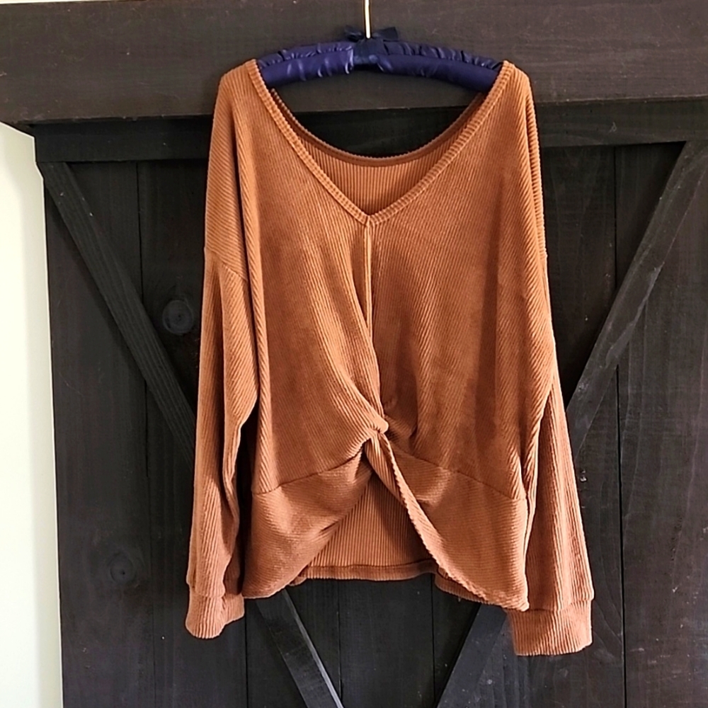 Low back pullover with back detail.